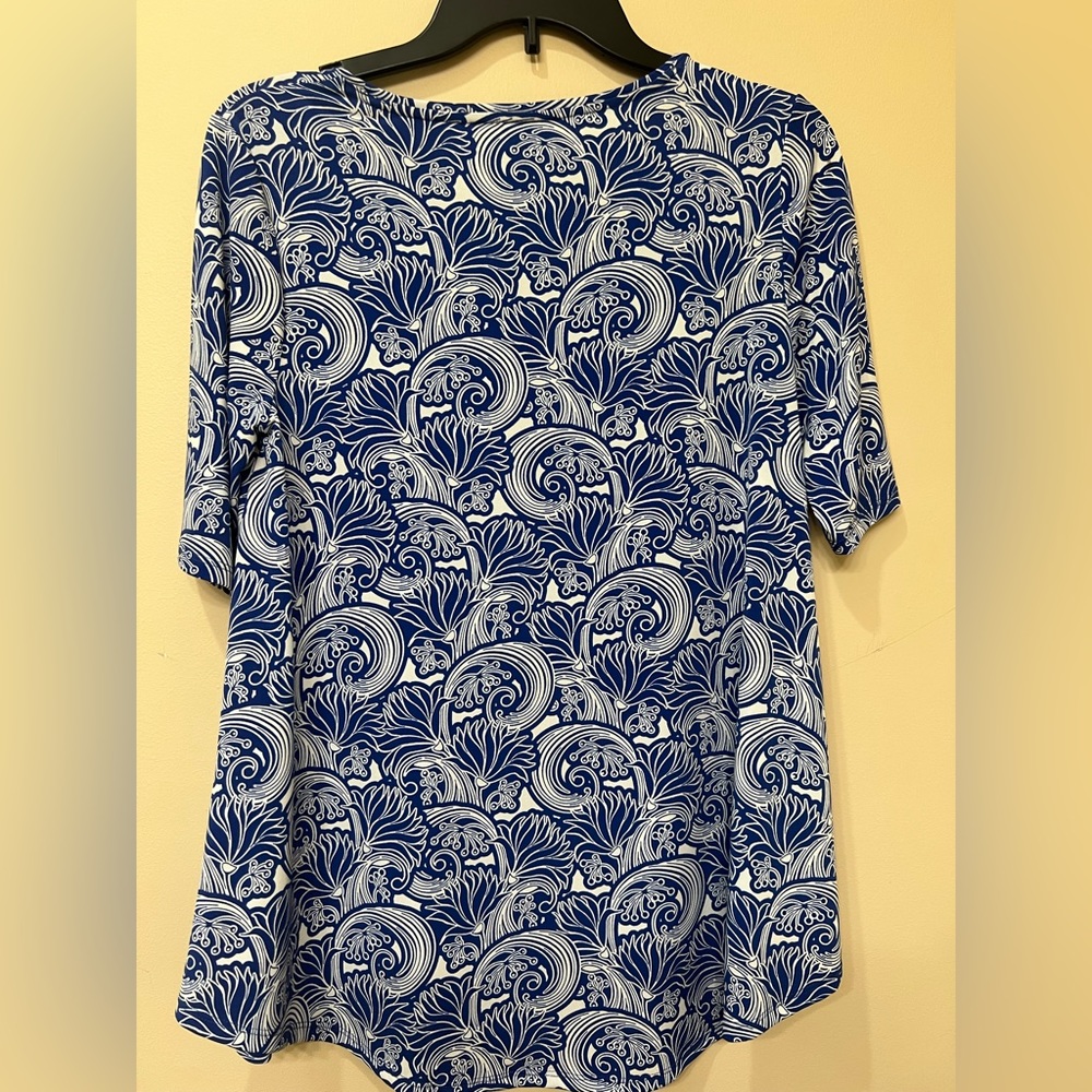 Chicos, size 0,  blue and white top, no iron, barely used, like new.